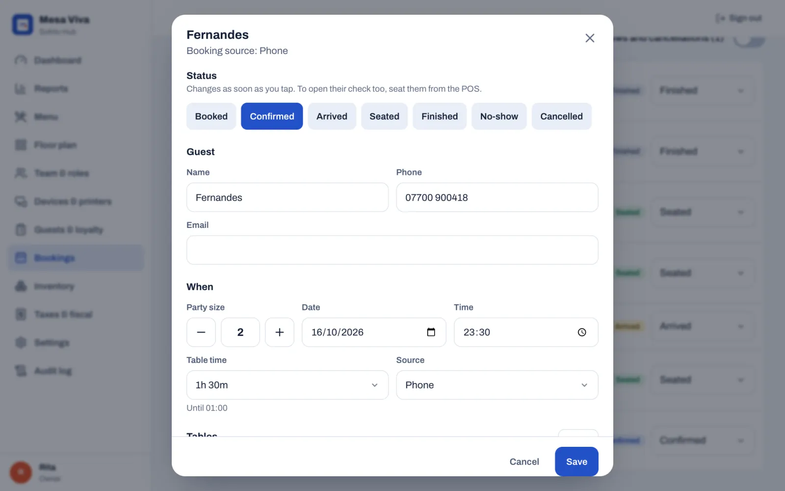 A booking opened in the back office: Fernandes, booked by phone. Under Status, the buttons Booked, Confirmed, which is selected, Arrived, Seated, Finished, No-show and Cancelled, with the hint that the status changes as soon as you tap and that seating from the POS also opens the check. Under Guest, the name and phone number. Under When, a party size of 2, the date 16/10/2026, the time 23:30, a Table time of 1h 30m until 01:00, and the source Phone.